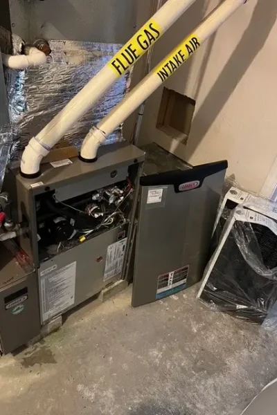 A room with a bunch of pipes and wires