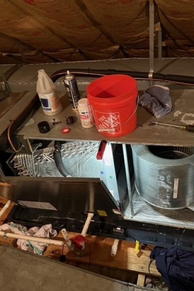 Attic HVAC air handler with maintenance tools