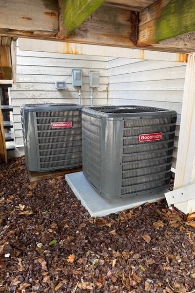 Two Goodman outdoor AC condenser units