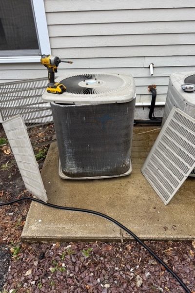 Outdoor air conditioning unit with removed panels