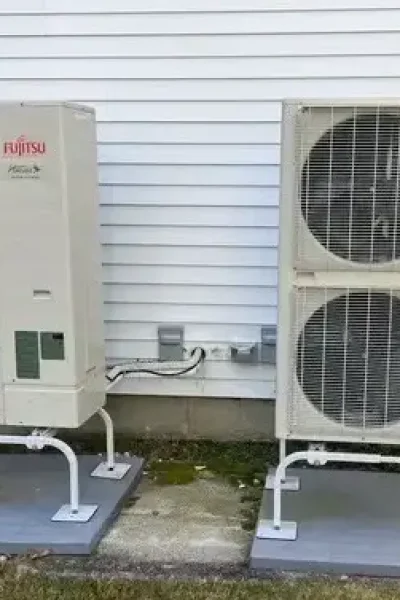 Two Fujitsu outdoor air conditioning units
